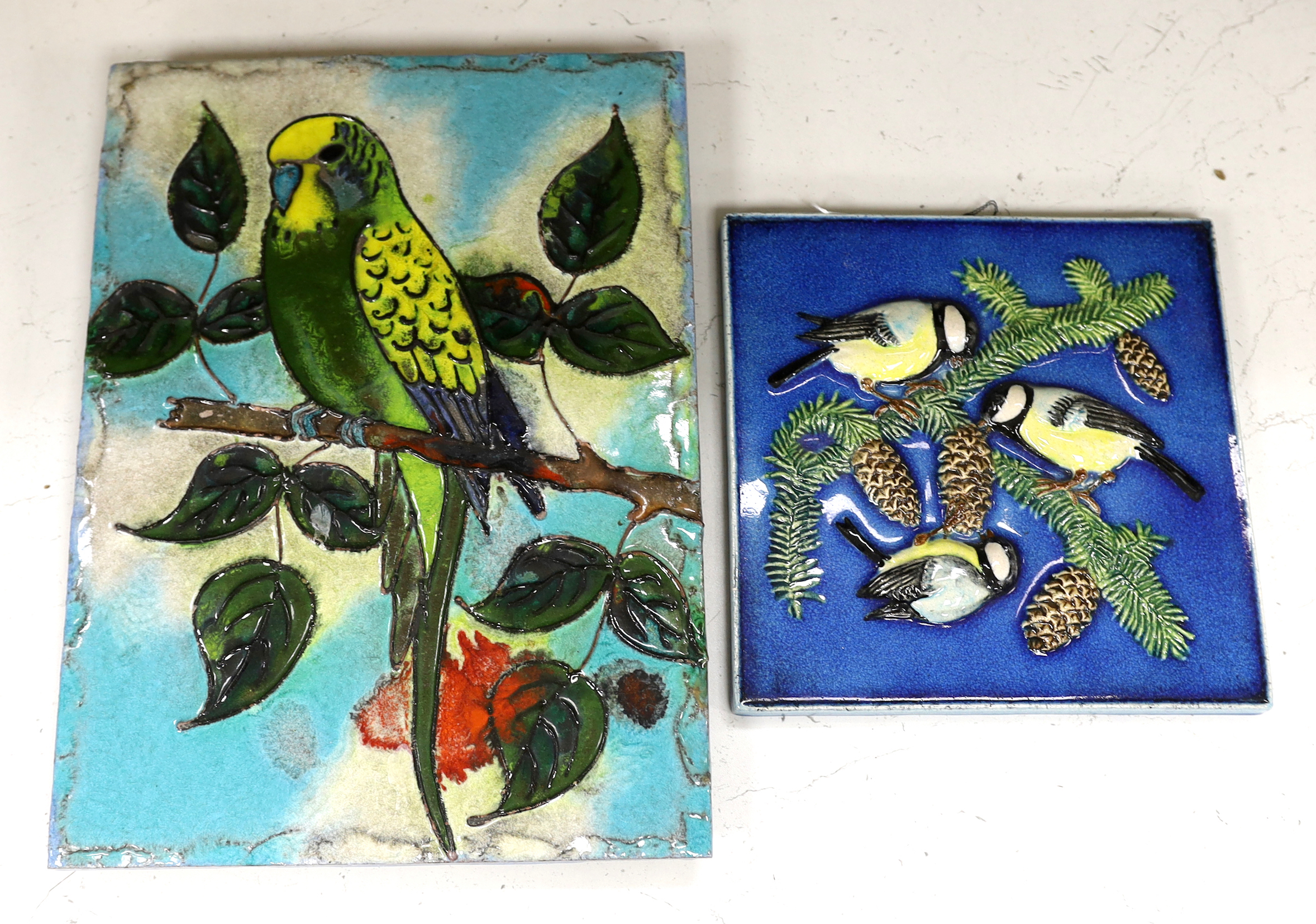 Two West German pottery Karlsruhe Majolika 1960s wall plaques of birds, the larger with budgie, smaller with blue tits, larger plaque 40 x 39.5cm